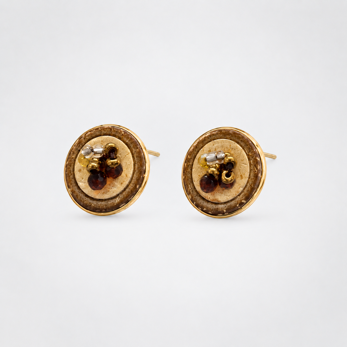 Brown beaded round stud earrings on light background