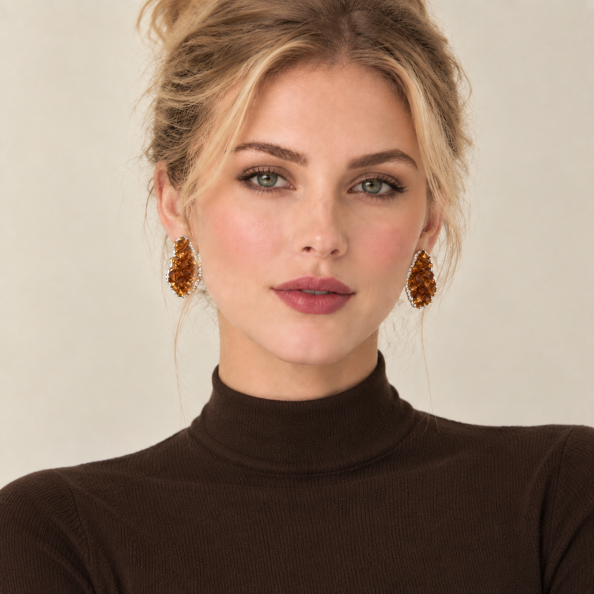 Model wearing brown crystal statement stud earrings