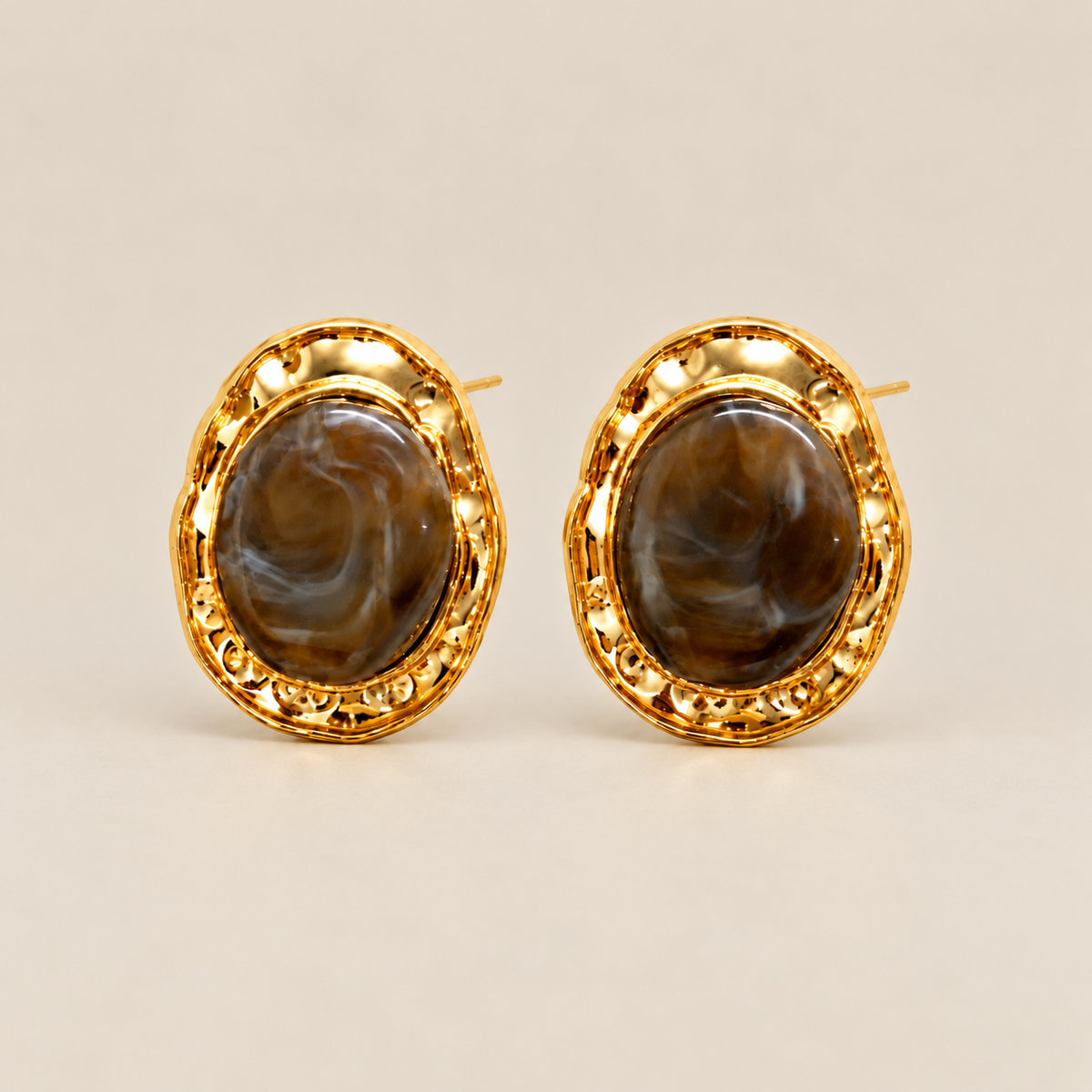 Brown imitation stone oval stud earrings with gold-tone frames
