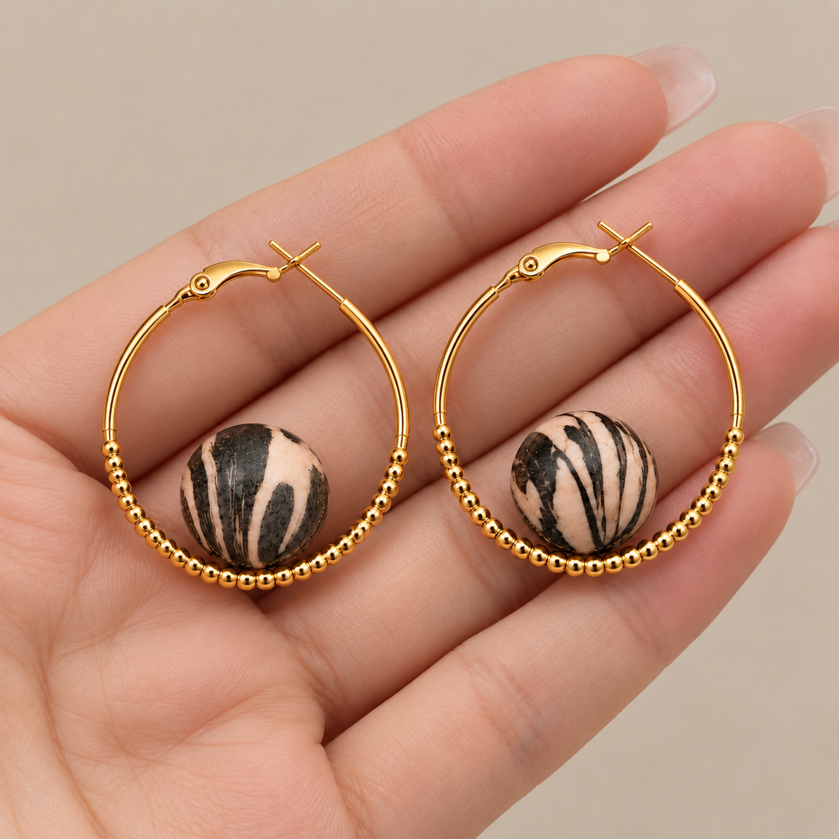 gold-beaded-hoop-earrings-hand-display-03.jpg