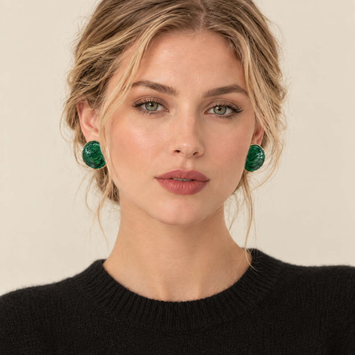 Model wearing green marbled round statement stud earrings 