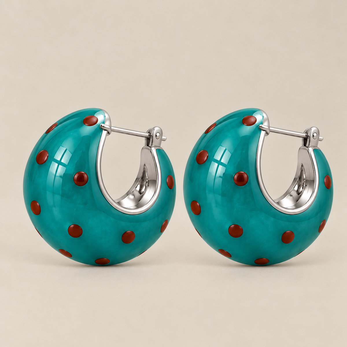 Green polka dot chunky hoop earrings with silver-tone details