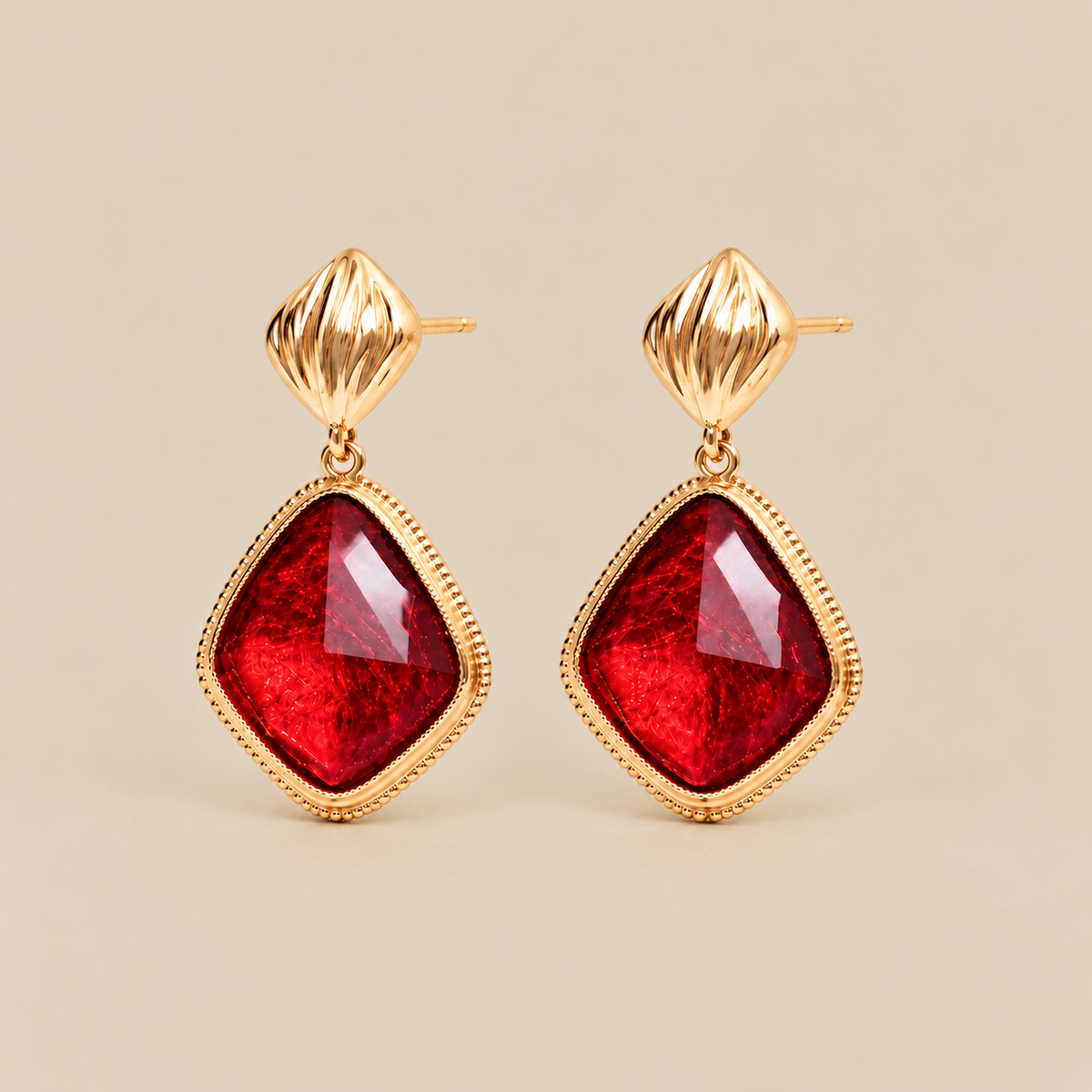 Red imitation gemstone drop earrings with gold-tone setting