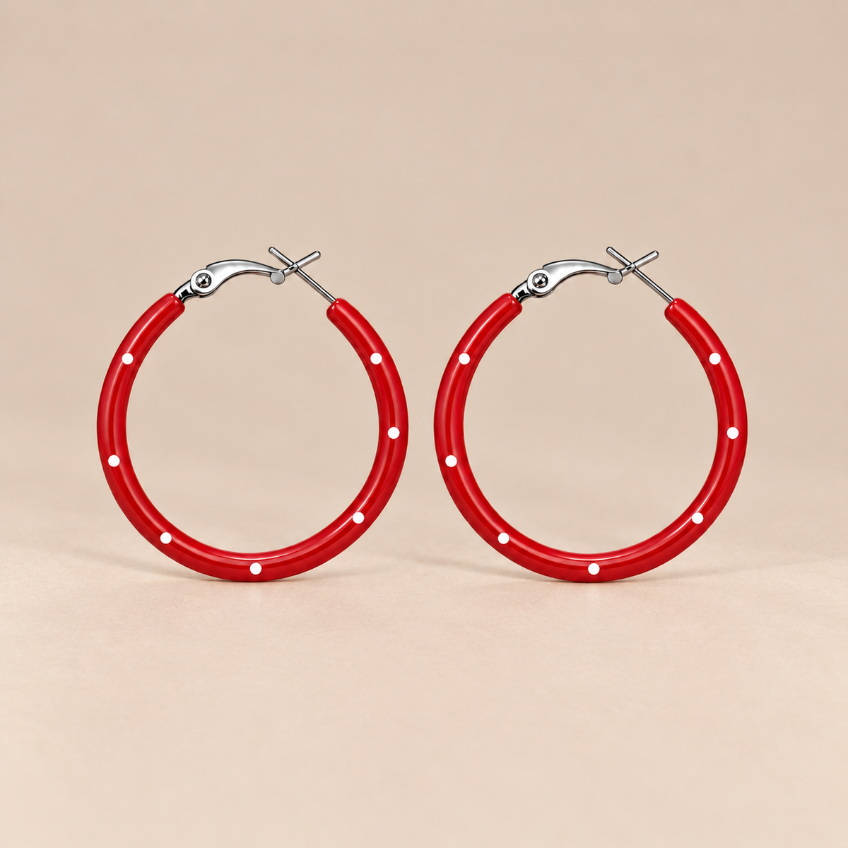 Red polka dot hoop earrings with white dot details
