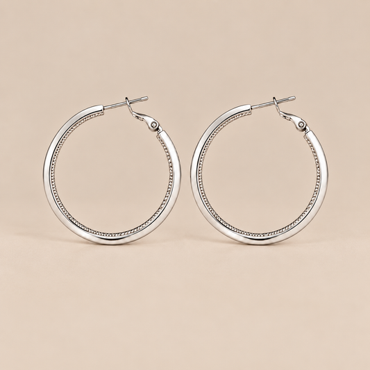 Silver textured hoop earrings front view
